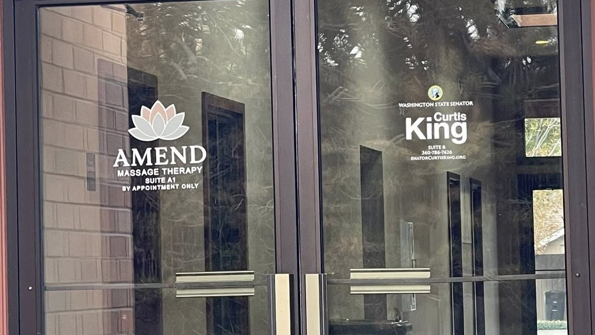 Amend entrance and suite signage